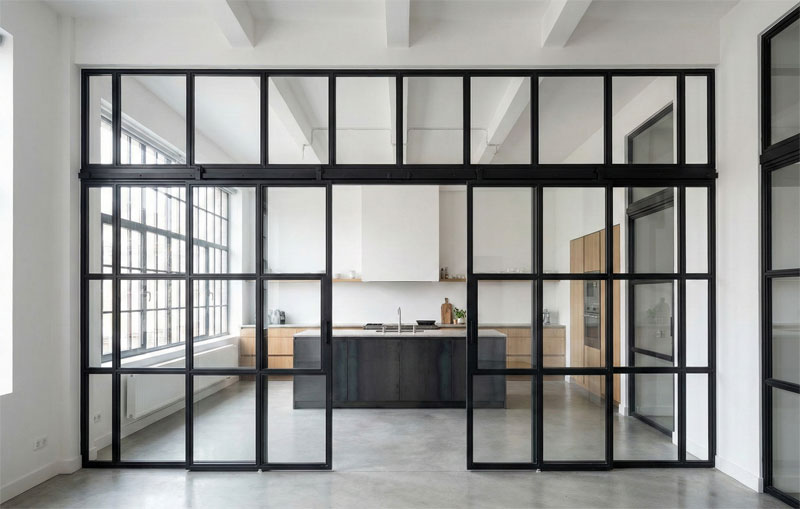 Verrière cuisine avec double porte coulissante en acier